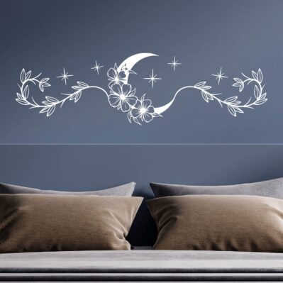 Decorazioni muro camera da letto con adesivi a tema luna e fiori in vinile bianco su sfondo blu elegante.