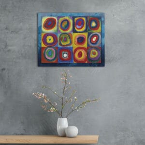 Quadro Kandinsky cerchi concentrici appeso su parete grigia con vaso decorativo, stampa su tela moderna colorata.
