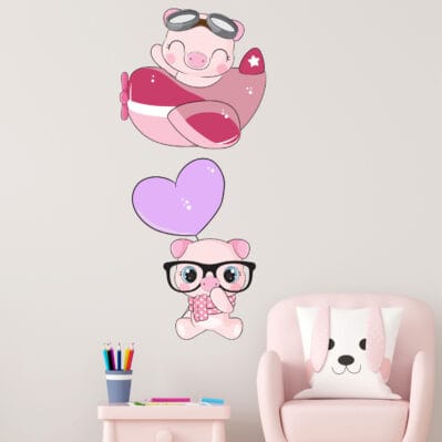 Stickers murali maialini per bambini in rosa con aeroplano e cuore, perfetti per decorare le camerette.