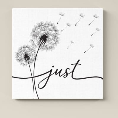 Quadro moderno su tela con scritta "just" e soffioni in bianco e nero