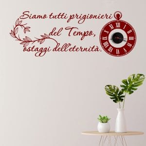 Orologio per la casa con stickers murali rossi e frase decorativa con orologio da parete.